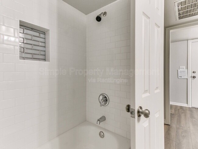 Building Photo - 9706 N Garnett Dr