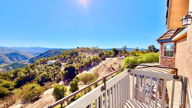 Building Photo - Spacious Two-Story Country Home with Amazing Views Looking out, and Privately Fenced and Gated Ya...