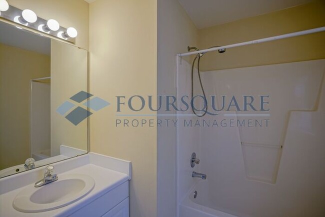 Building Photo - Townhome | 2nd Bedroom Features an En-Suit...