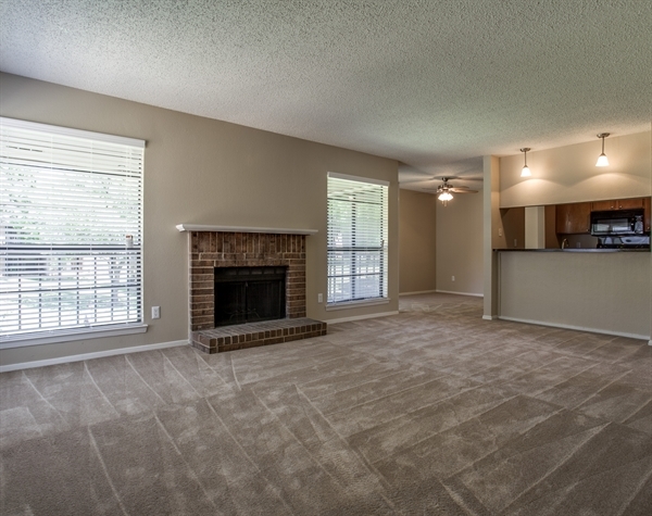 Living Room - Whispering Oaks Apartments