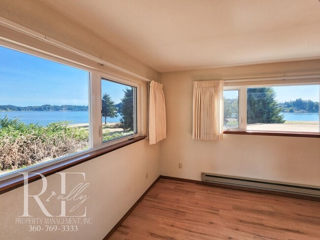 Building Photo - Waterfront Views & Peaceful Living – 2BR w...