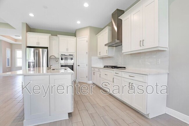 Building Photo - 6133 Lungo Lago Dr