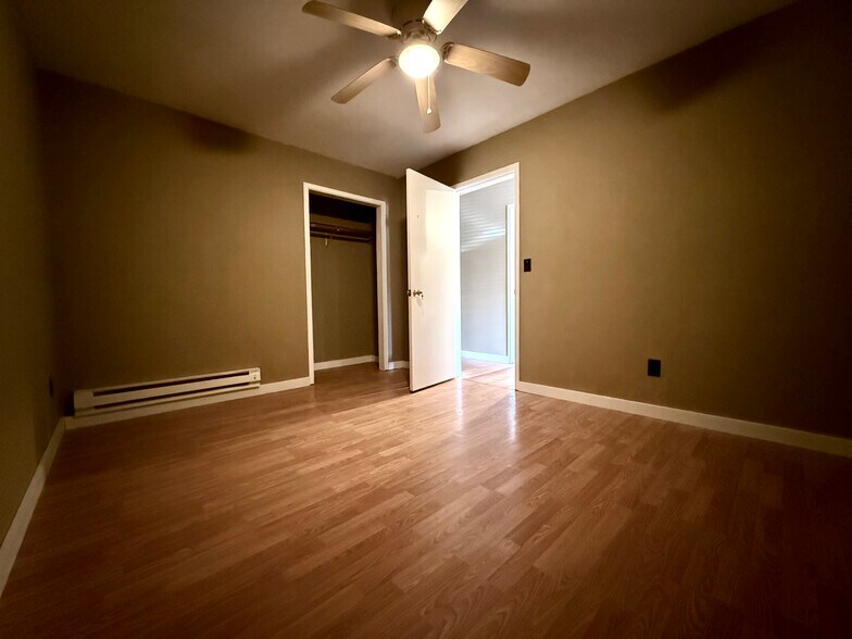 First bedroom has modern fan and deep closet - 377 AR 56 Hwy