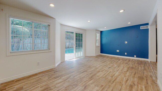 Family room... - 18406 Bessemer St