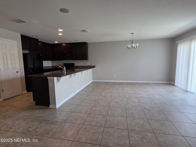 Building Photo - 6553 Winding Greens Dr