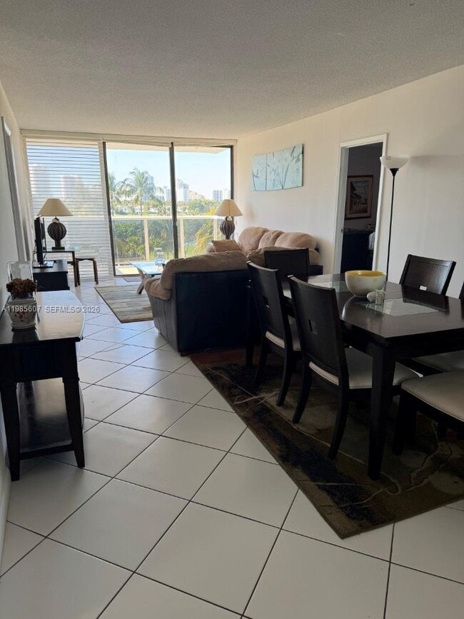 Building Photo - 3675 N Country Club Dr