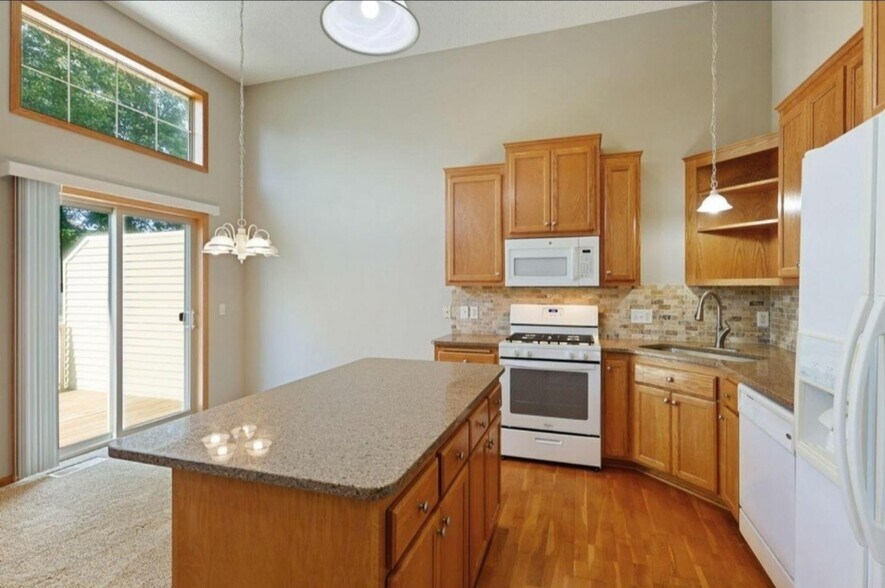 Kitchen and dining room. - 8437 W 149th St