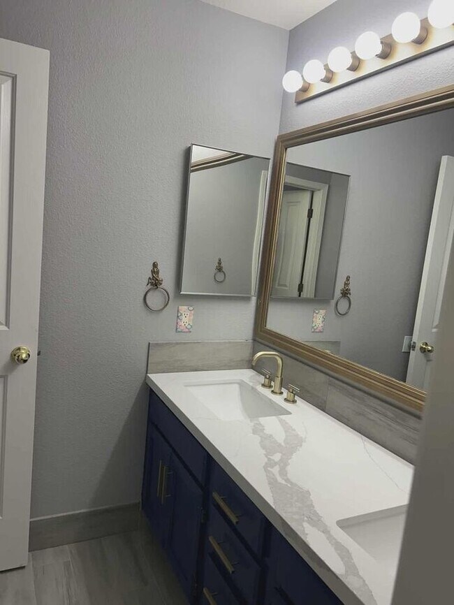 Building Photo - Welcome to this STUNNING 4-bedroom, 2.5-ba...