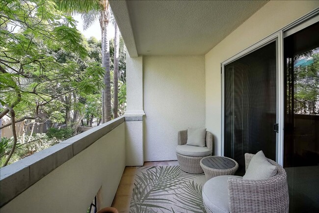 Building Photo - The American Riviera Living at El Escorial Villas