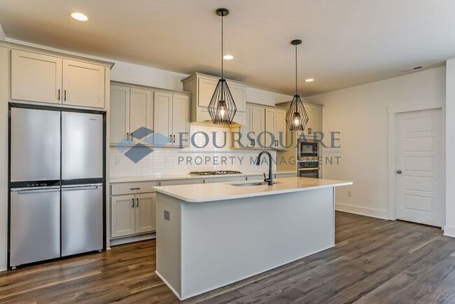 Building Photo - Beautiful 3-Story End-Unit Townhome with Guest Suite, Private Balcony & 2-Car Garage – Wendell, NC