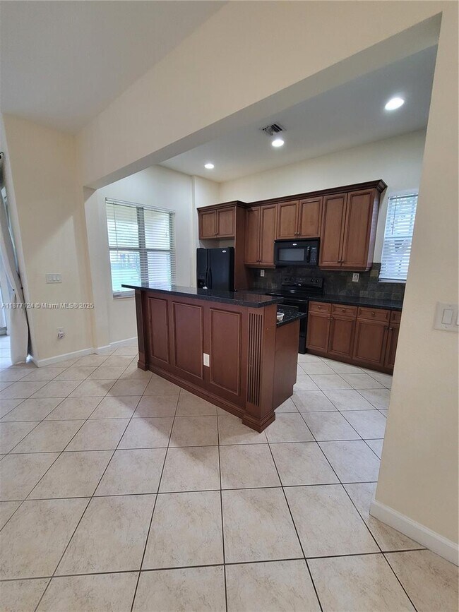 Building Photo - 6033 NW 118th Dr