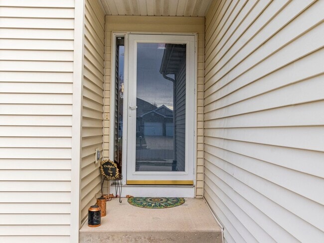 Building Photo - Spacious 3BR/3BA Condo with Finished Basement + 2-Car Garage — Available Now