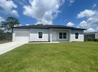 Building Photo - NEW CONSTRUCTION! Modern 3BR/2BA Home with Garage-Peaceful Lake Placid Location