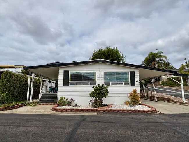 Primary Photo - Welcome to the vibrant 55+ mobile home com...