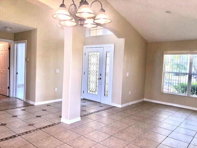 Building Photo - EAGLE CREEK LAKE NONA! WELCOME HOME! Beautiful water views! Spacious 2 story-3 bedroom 2.5 bath h...