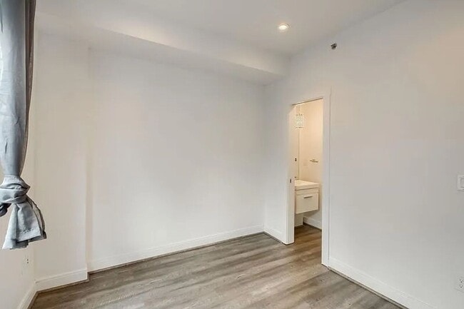 Building Photo - Modern LoHi Living with Rooftop Deck & City Views!!