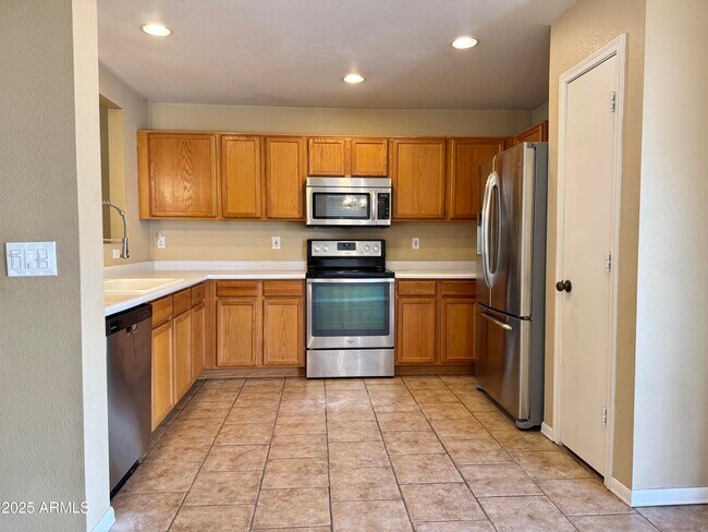 Building Photo - 15672 W Port Au Prince Ln