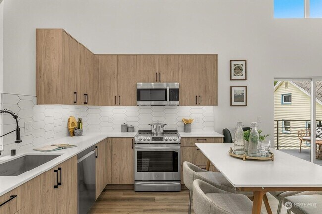 Building Photo - Welcome Home -Modern and Expansive Windows