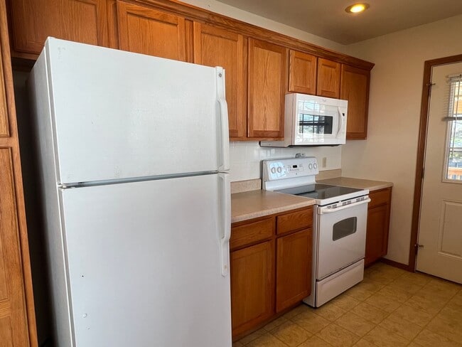 Building Photo - COMING SOON! All-Brick Duplex near Nixa High School