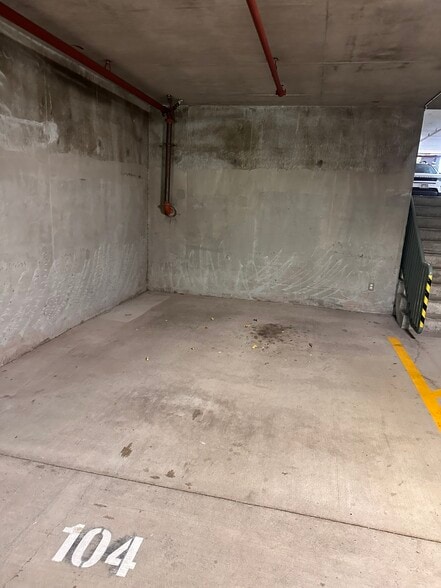 2 extra wide parking spots located at main lobby level - 421 Olohana St