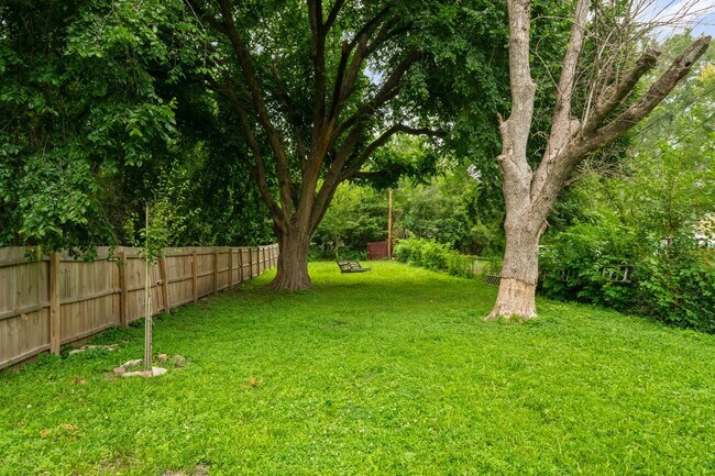 Building Photo - 3 Bedroom Townhome With Fenced Yard and 1 Car Garage