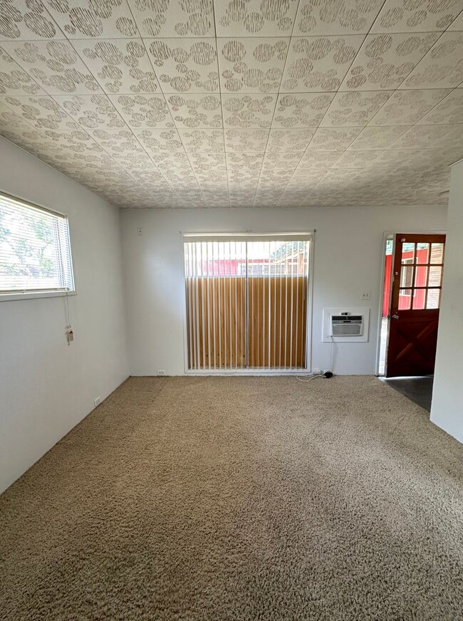 Building Photo - Cutest 3-Bedroom House with Covered Back Patio + Bonus Storage/Office!