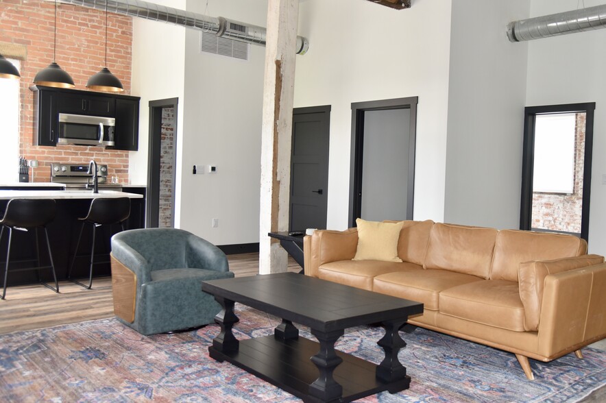 Open concept living, spacious living, room, kitchen and dining area - 101 W Broadway St