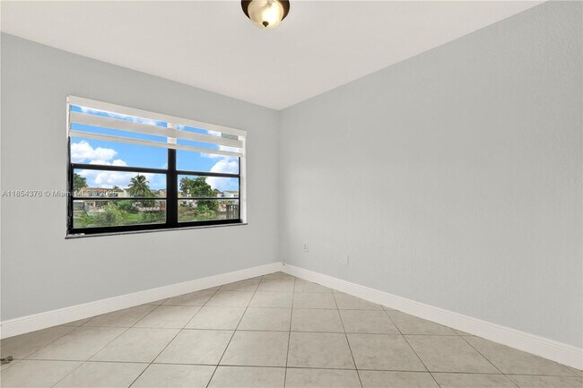 Building Photo - 1335 W 68th St