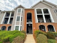 Building Photo - Stylish 3 Bed 3 Bath Condo With Large Balcony in Desired Riverbend at Cascades - Water Included