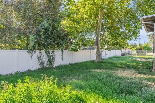 Building Photo - Spacious 4-Bedroom Layton Home with Finished Basement and 2-Car Garage