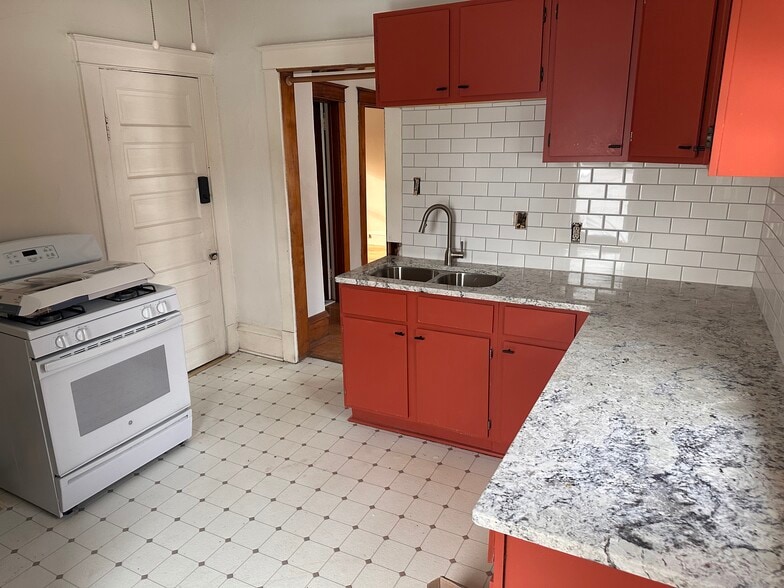 Freshly updated Kitchen 1 - granite countertops and subway tile. - 1110 27th Ave NE