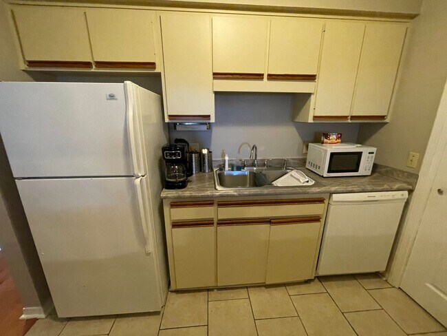 Building Photo - For Lease - Fully Furnished 2 BR | 1.5 BA Townhome in PCB!