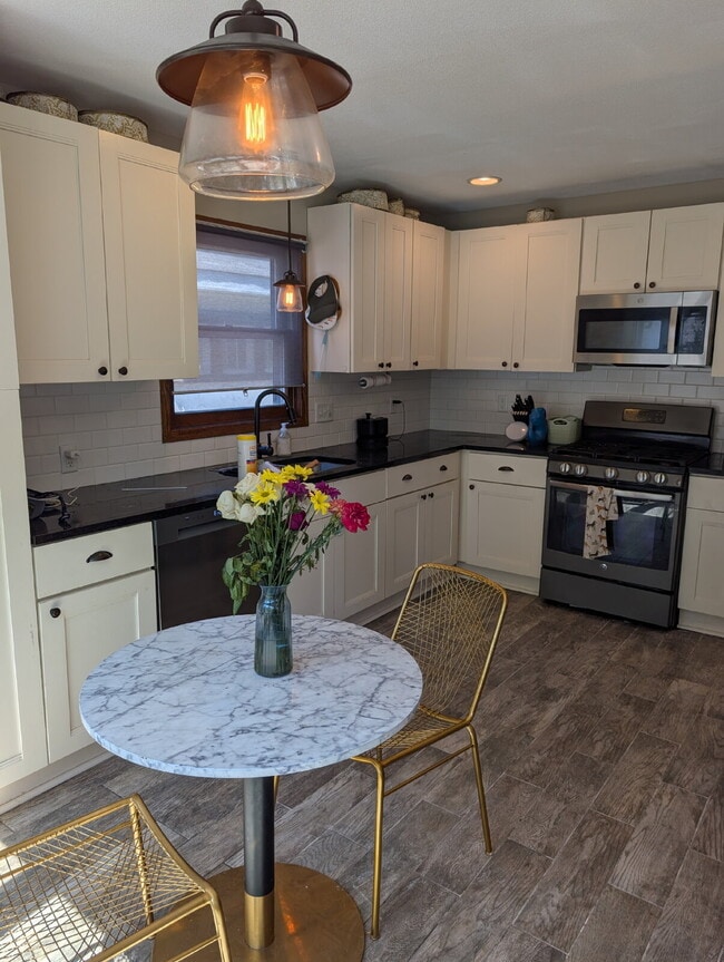 Building Photo - 3BR/2BA Northeast Minneapolis Home With Character, Privacy, and Room to Relax