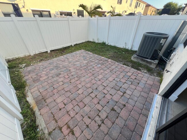 Building Photo - 9399 W 33rd Ln