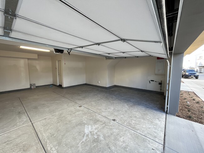 Spacious 2-Car Garage with Storage Space - 8183 Spirit St