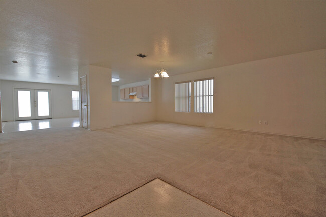 Building Photo - SPACIOUS 3208 SQUARE FOOT HOME FEATURING 4...