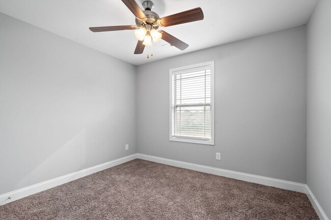 Building Photo - Pet Friendly Three Bedroom with Bonus!