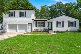 Building Photo - Spacious Split-Level Living with Dual Fireplaces & Expansive Deck