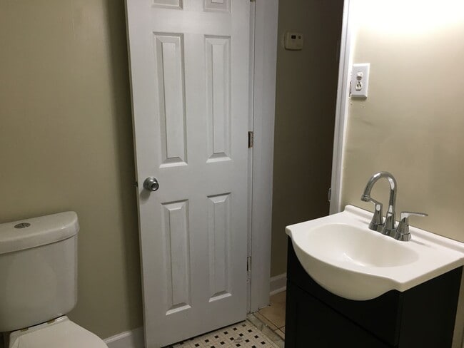 Building Photo - Charming home with a New Kitchen, tile flo...