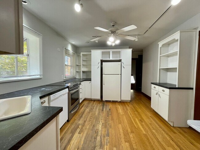 Building Photo - $0 DEPOSIT OPTION, NEW PAINT, TRADITIONAL BRICK HOME, WALKING DISTANCE TO DU!! LARGE BACKYARD, DE...