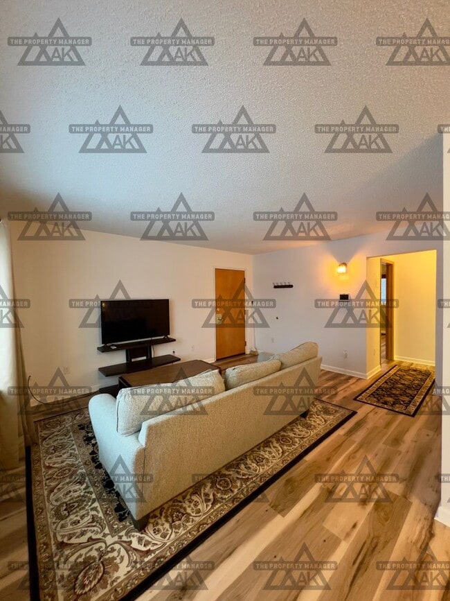 Building Photo - Charming Partially Furnished 2-Bedroom Condo for Rent