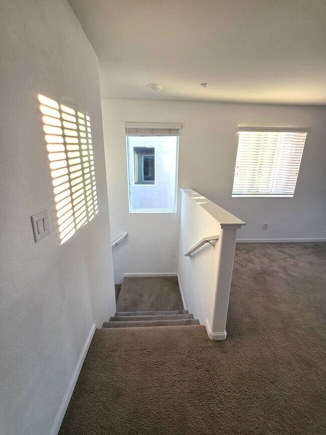 Building Photo - Spacious 5BR + Loft in Hamptons Village – Studio Suite, New HVAC, EV Charging