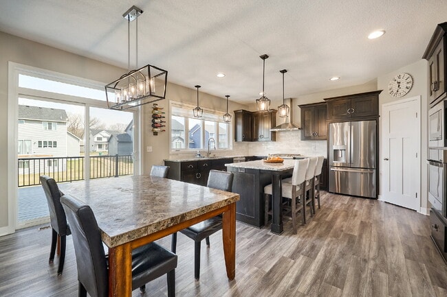 Building Photo - Spacious 4-Bedroom Gem with Modern Comforts and Finished Basement in Vadnais Heights!