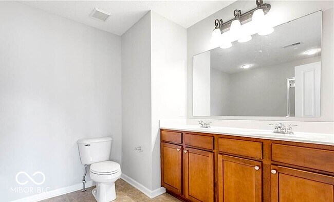 Building Photo - 9008 Rider Dr