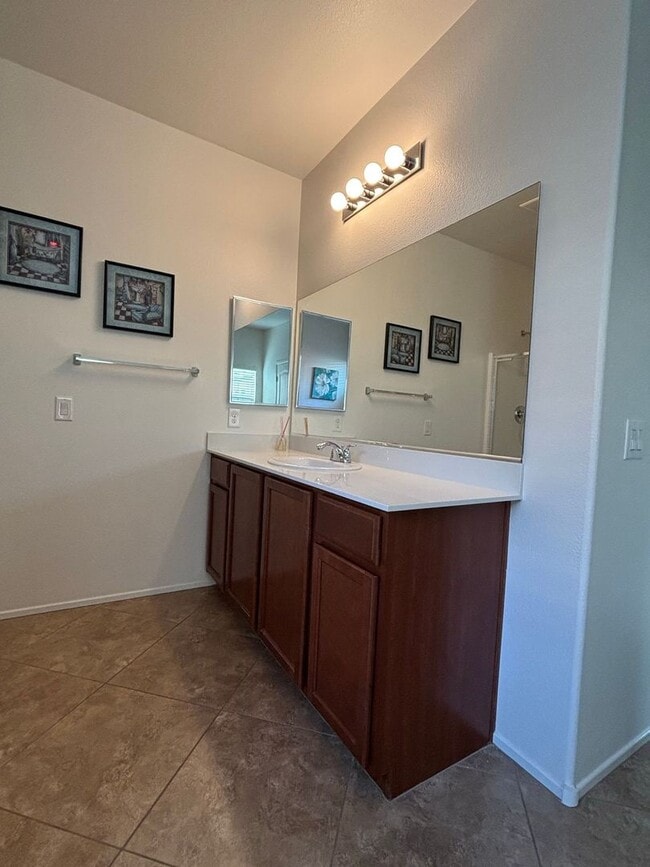 Building Photo - Gated 3-Bedroom Home with Community Pool Near Fort Apache & Blue Diamond