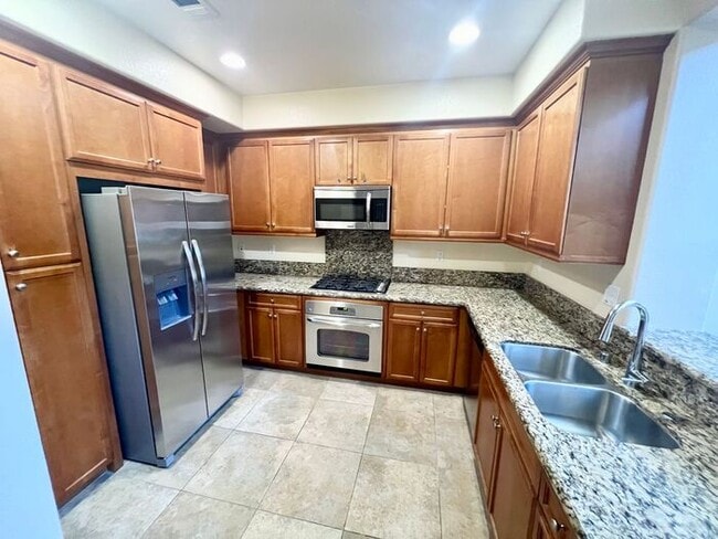 Building Photo - Resort-Style Living with Private Balcony Near Community Pools