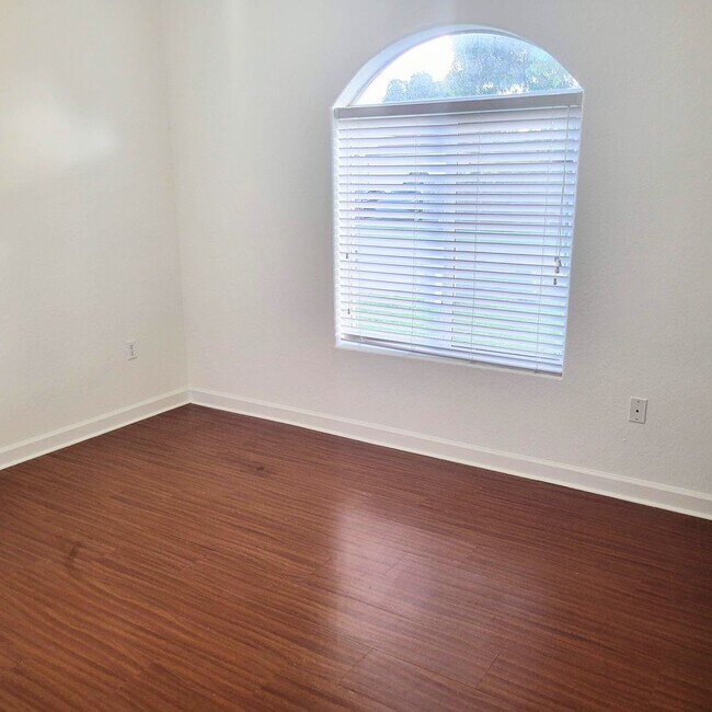 Building Photo - Single-story, 3/2.5 corner lot located near multiple FL Turnpike exits