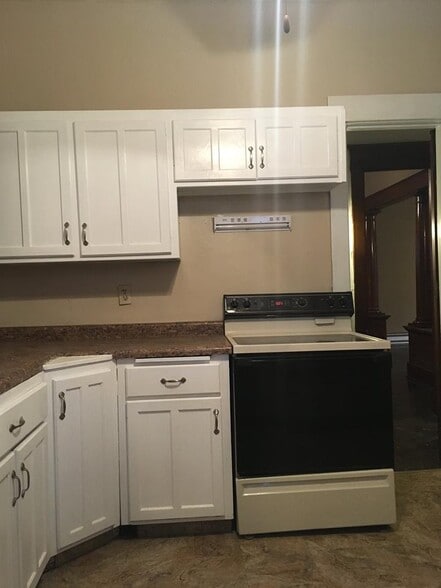 updated counter tops, lazy Susan and integrated cutting board. Cabinets have been painted inside and out. - 1545 S 13th St