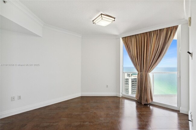 Building Photo - 16699 Collins Ave