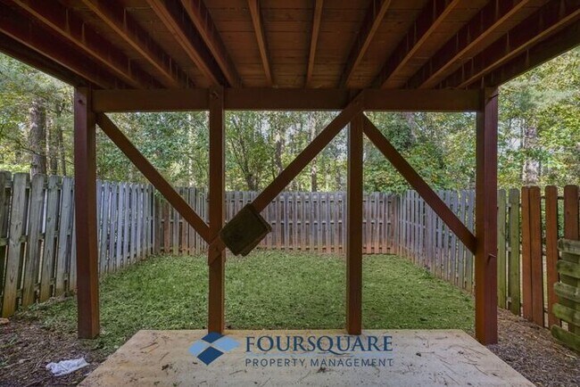 Building Photo - Lakefront Townhome with 1st Floor Bedroom, Fireplace & 2-Car Garage – In Raleigh